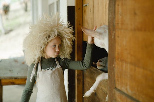 children interacting with farm animals