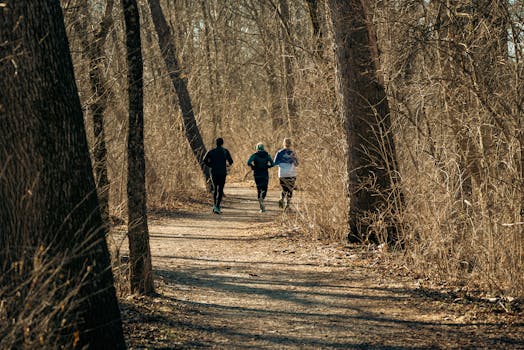 Group of adults participating in a forest school training program